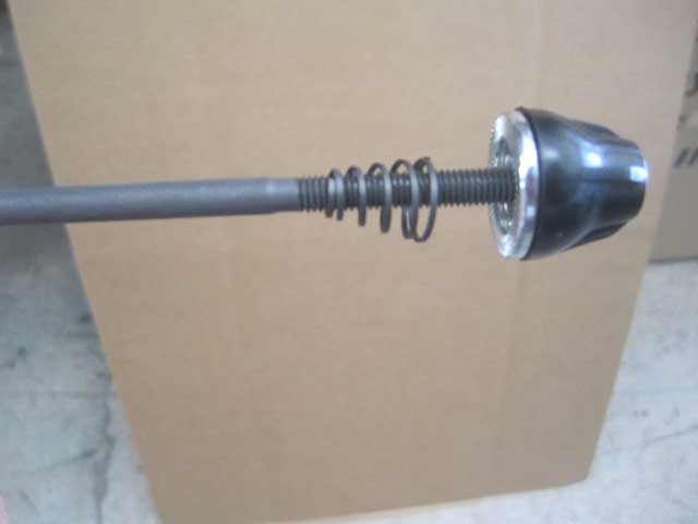 Remove locknut and spring,