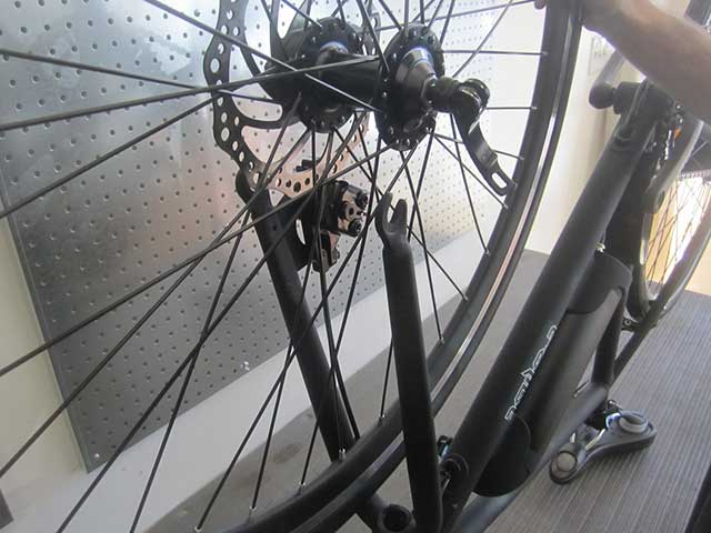 Gently insert wheel into fork