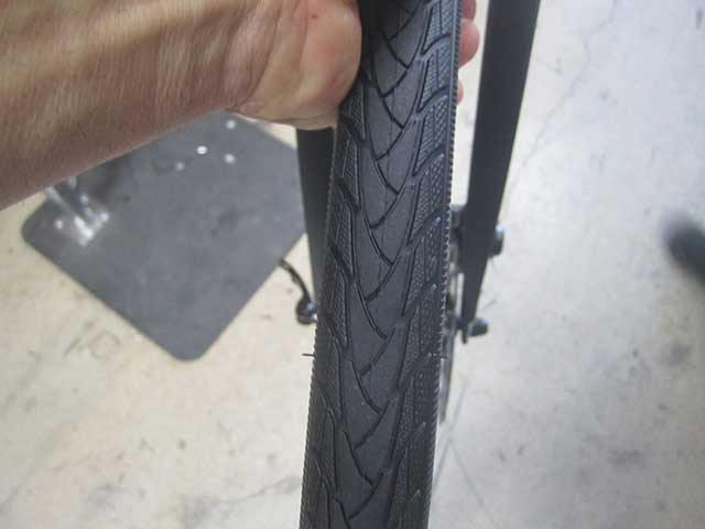 Spin the wheel. Your brake has been adjusted prior to shipment, and should be aligned perfectly.