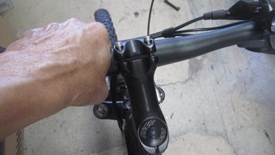 14. Adjust handlebars to a comfortable position, and tighten allen heads snugly with a No. 4 allenhead wrench. Tighten in a X pattern.