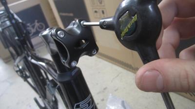9. Remove four handlebar mount allenheads with No. 4 allen wrench